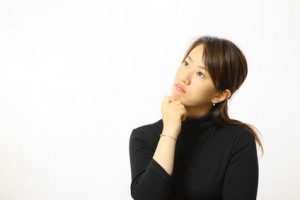 Japanese woman thinks about something